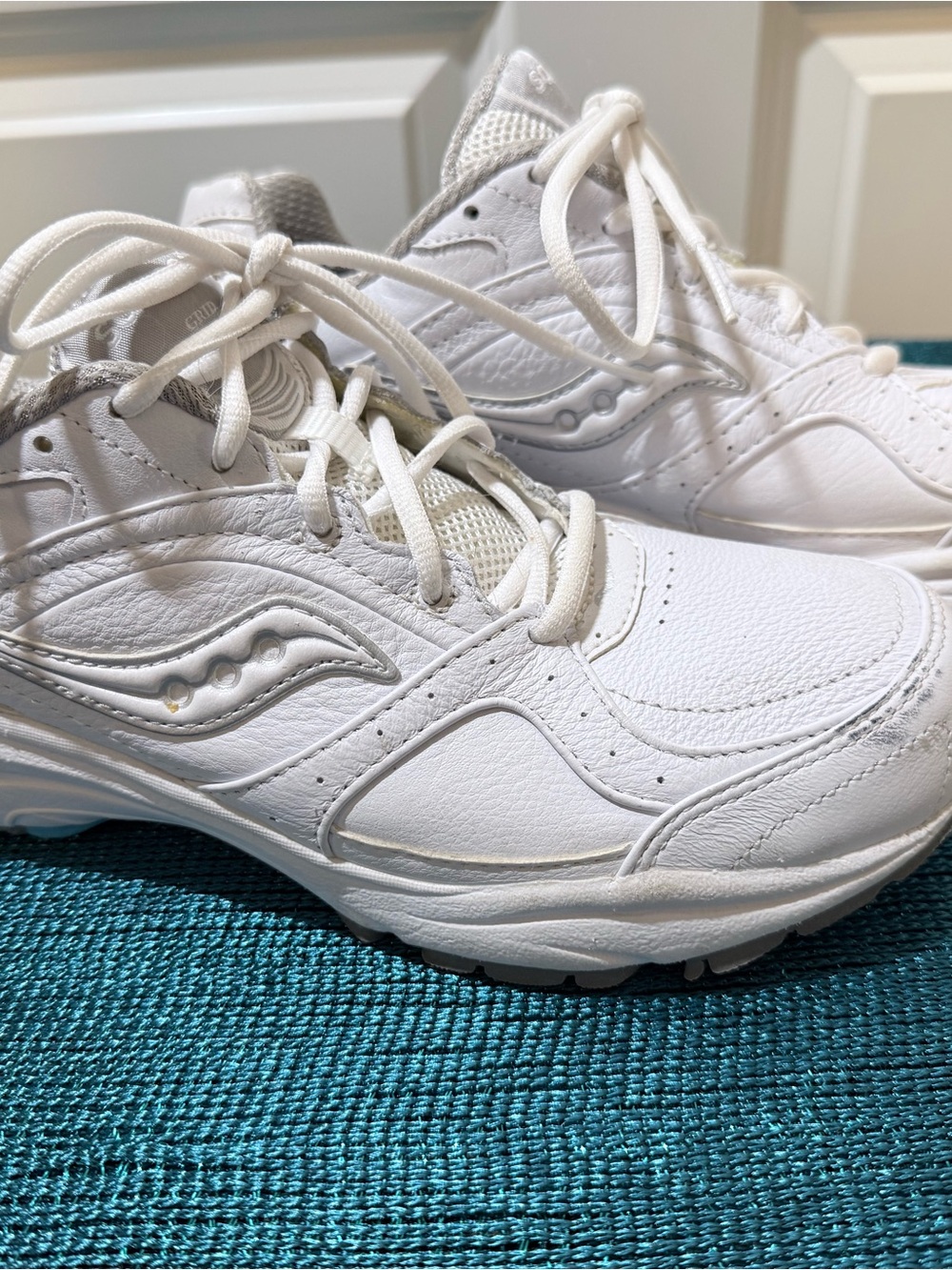 Saucony All-White Leather Athletic Sneakers